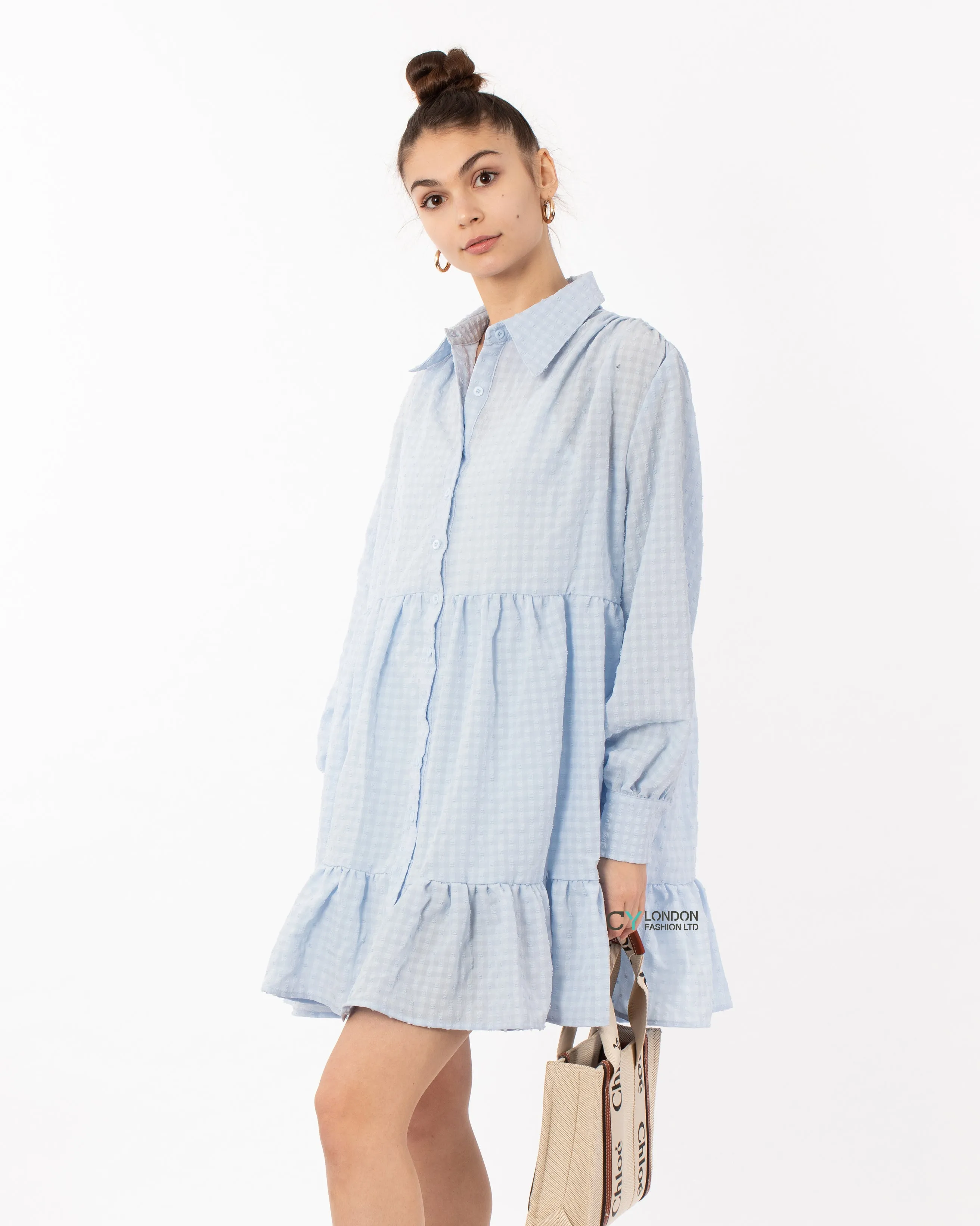 Blue color Oversized shirt dress in pop pattern fabric in ruffle hem design