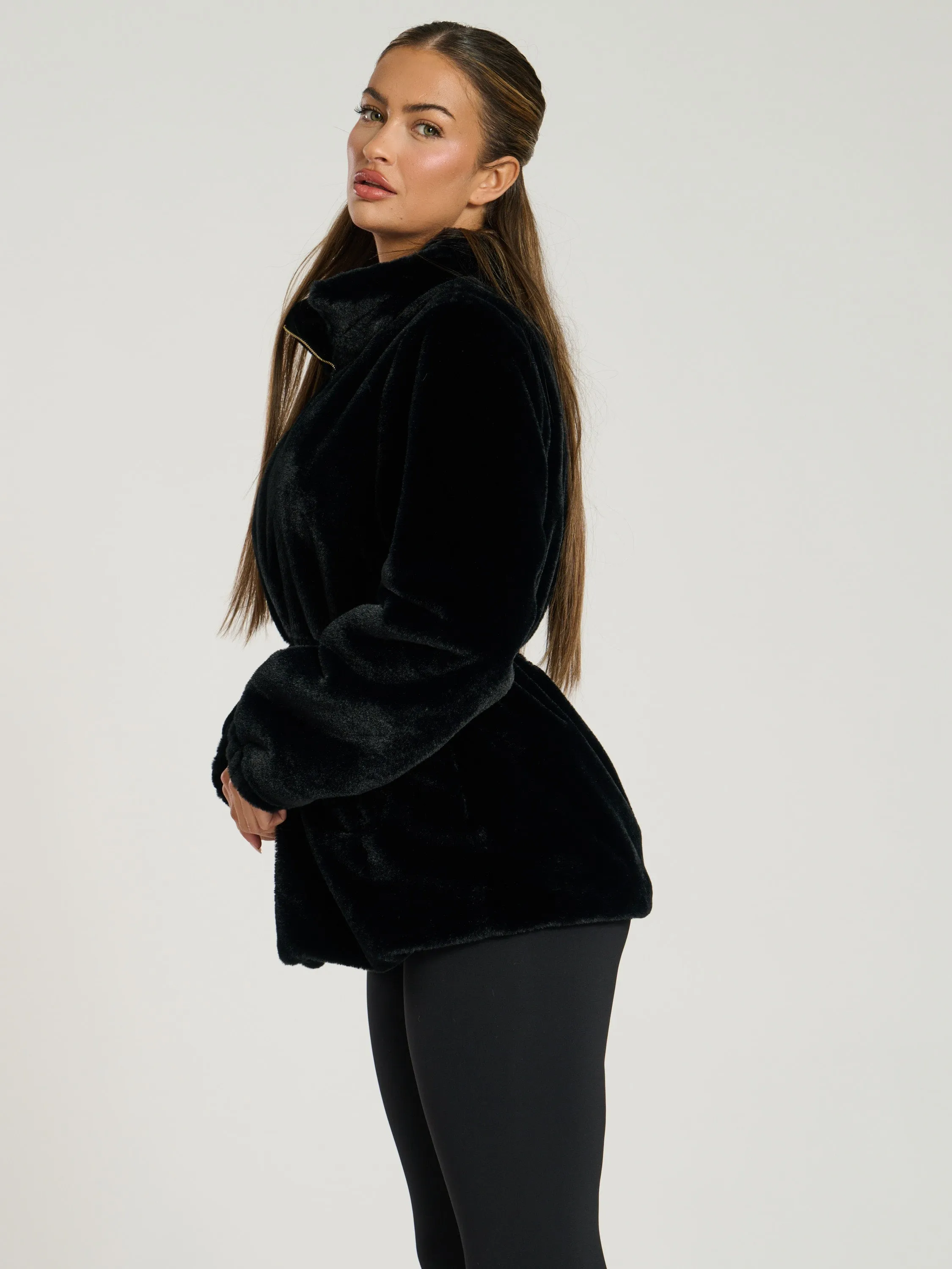 The 'Tied up' cosy faux fur tie waist jacket in black